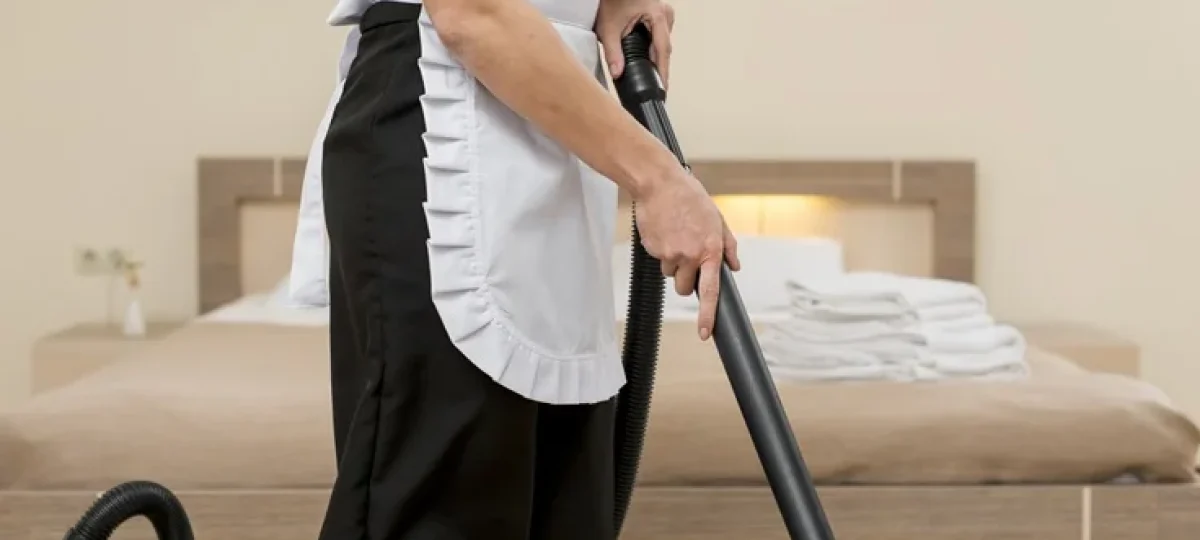 chambermaid-preparing-hotel-room
